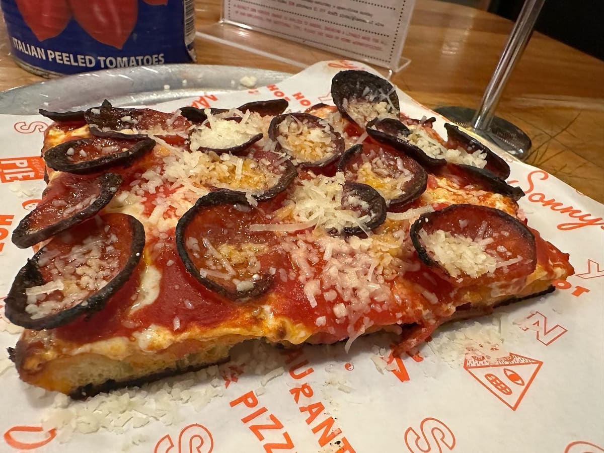 Square pizza slice at Sonny’s Pizza