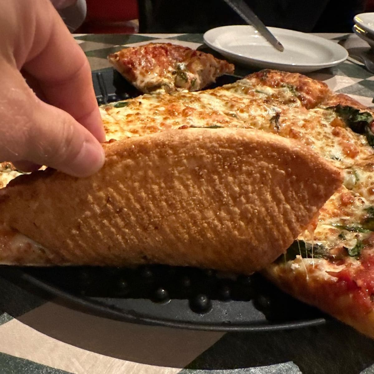 Underside of the pizza crust at Sorrento’s