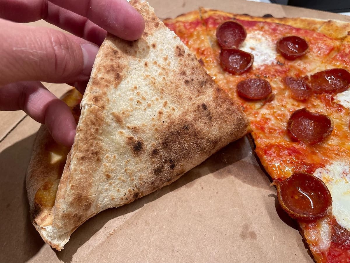 Underside of the pizza crust at Timber Pizza Co