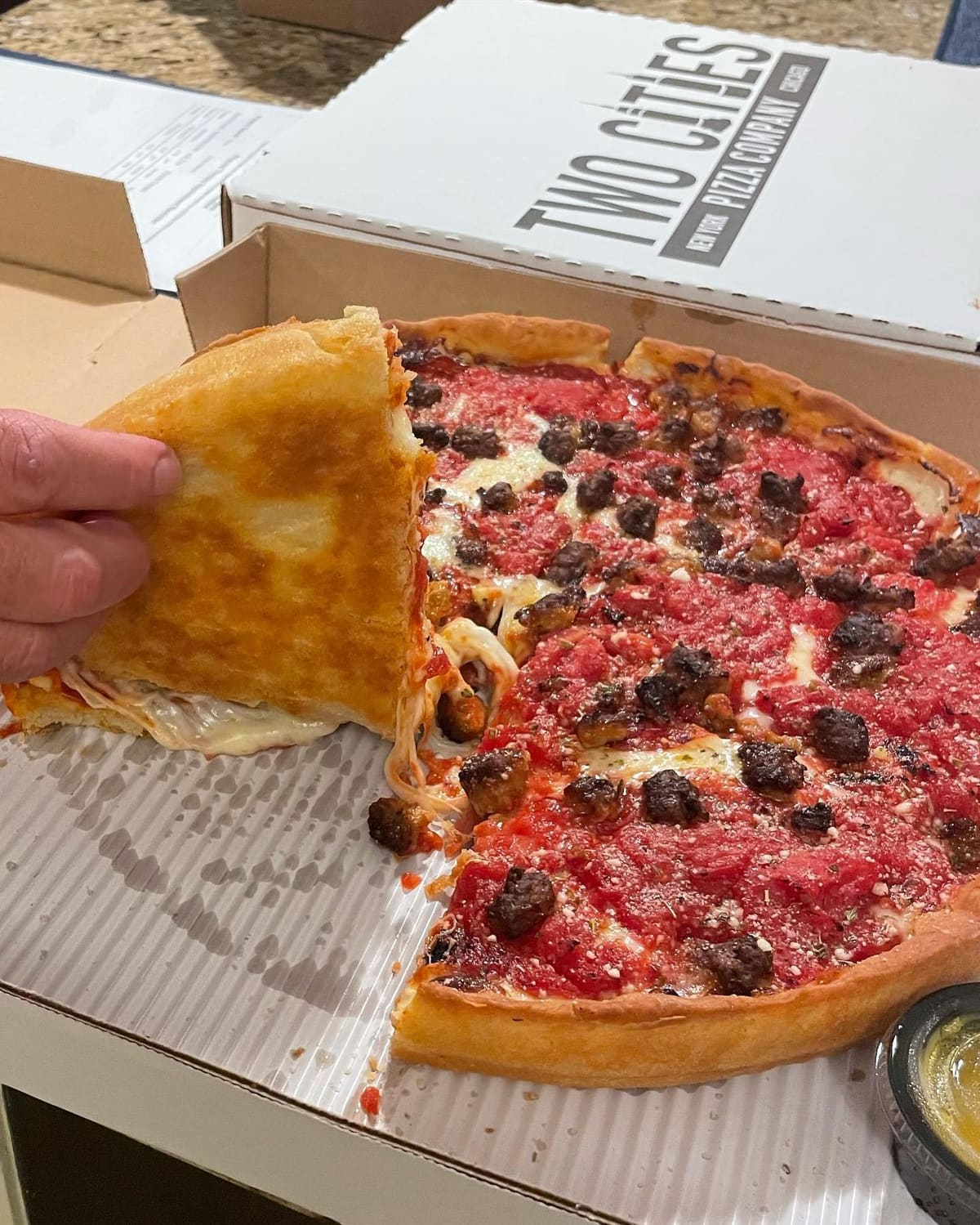 Pizza slice at Two Cities Pizza Co