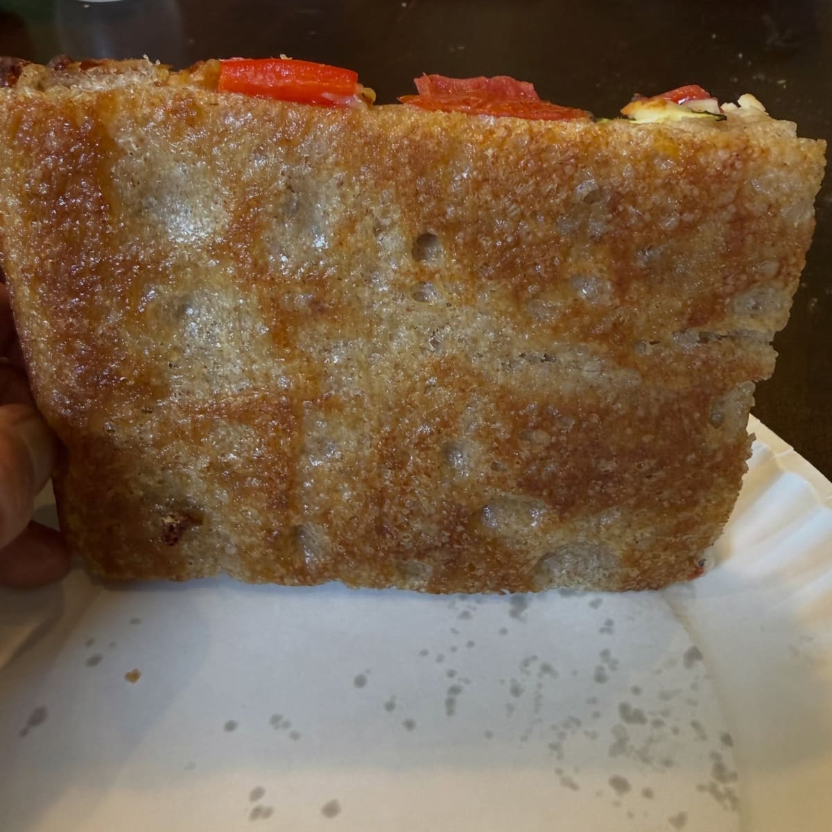 Underside of the pizza crust at Two Seven Two