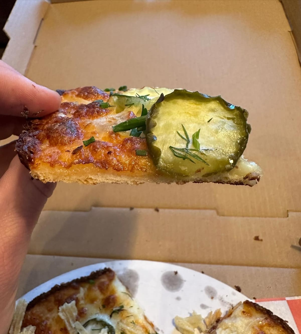 Close view of a pizza slice at Wayfarer Pizza