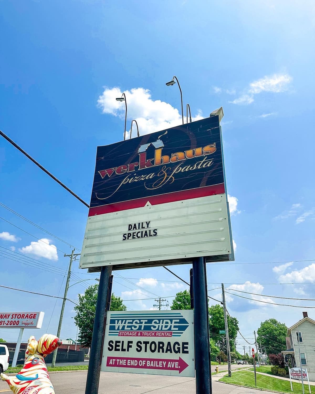 Restaurant sign at Werkhaus Pizza