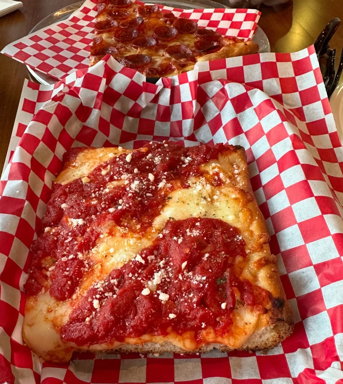 Square pizza slice at Your Mom’s Pizzeria