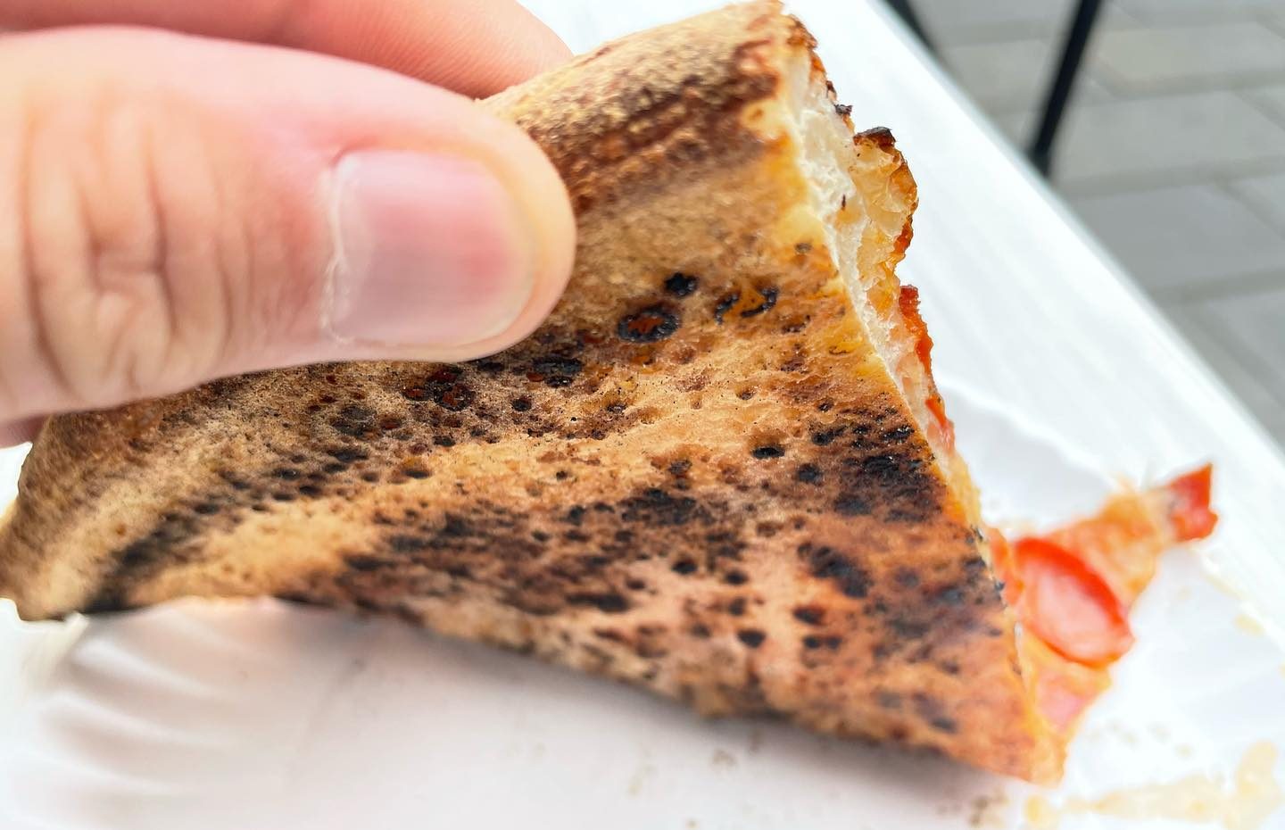 Underside of the pizza crust at Zazzy’s Pizza