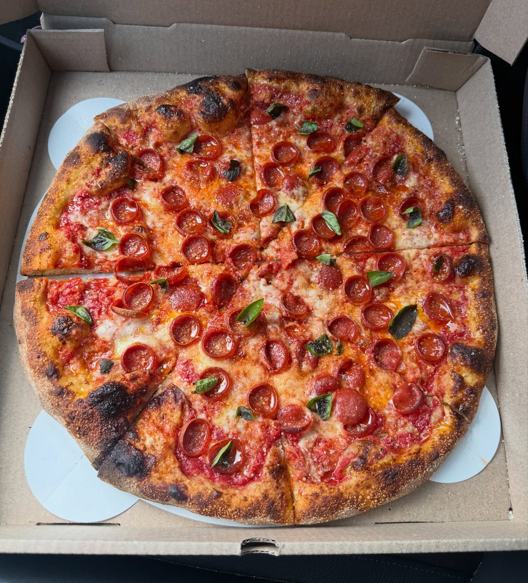 Whole pepperoni pie with basil in the box, Red Bird Pizza